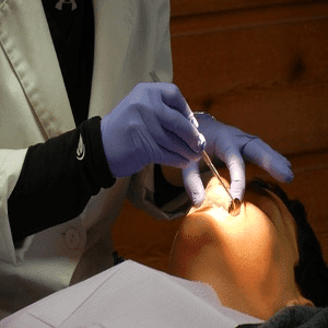 Orthodontist Working Teeth