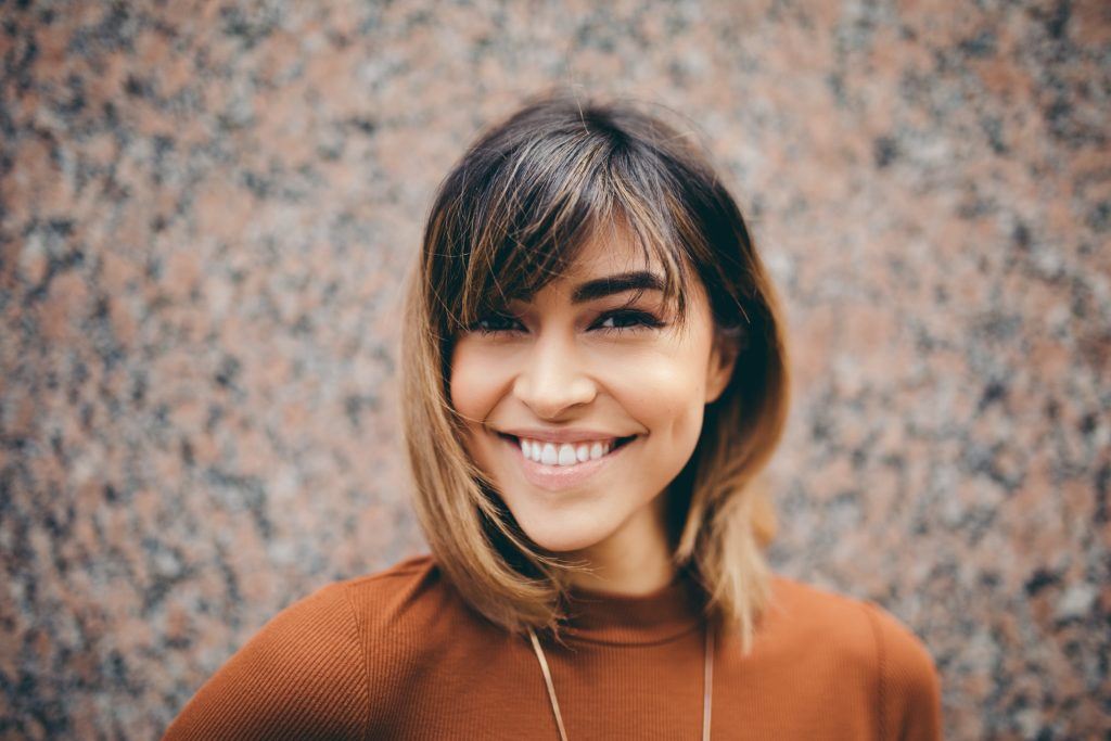 woman smiling with straight white teeth