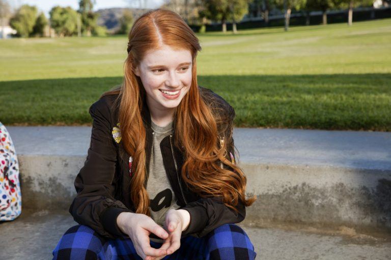 Girl Smiling While At Park