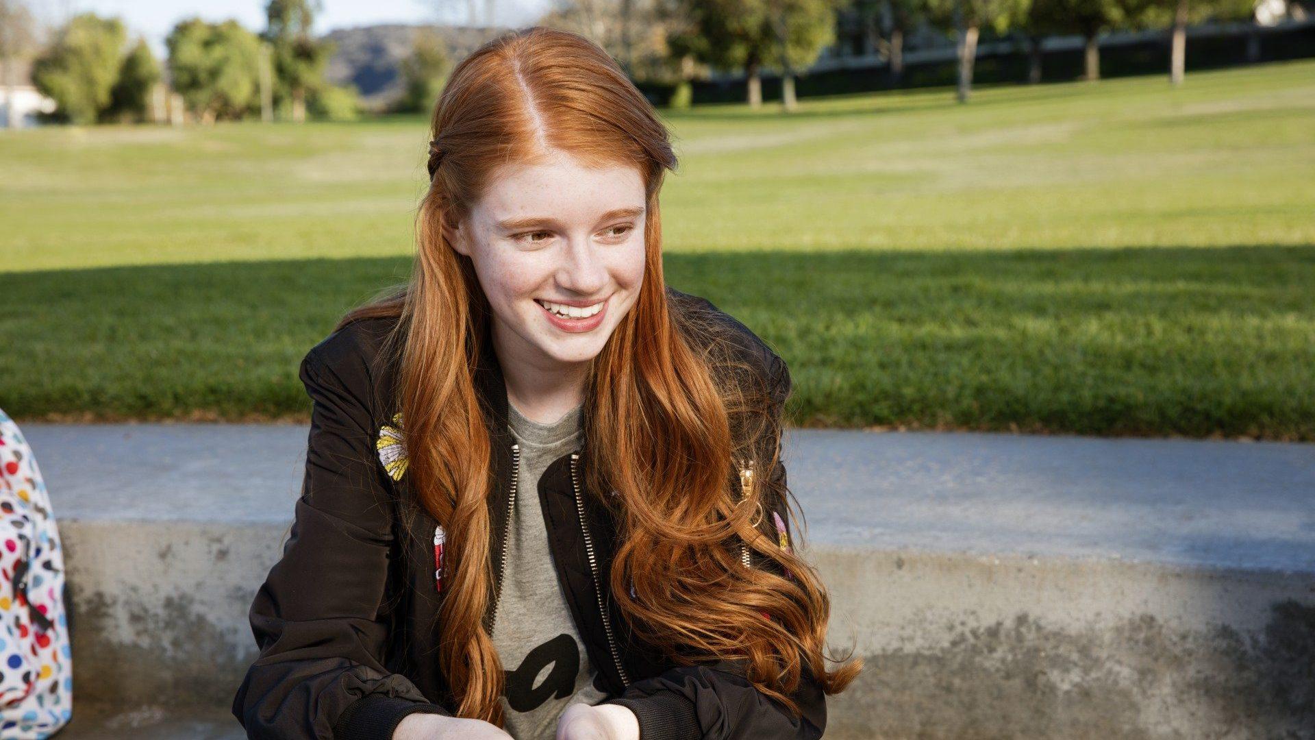 Girl Smiling While At Park